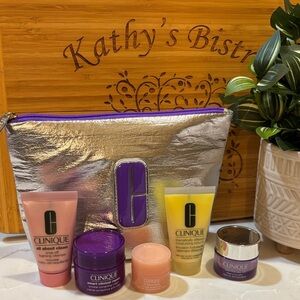 Clinique Skincare Collection Travel/Sample Size and Silver Cosmetic Bag NWOT